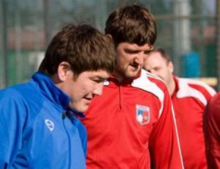 Тлешев и Остапенко тренируются с чемпионом