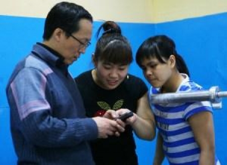 Алексей Ни со своими подопечными Майей Манезе и Зульфией Чиншанло