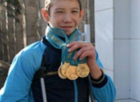 Четыре медали пловца...