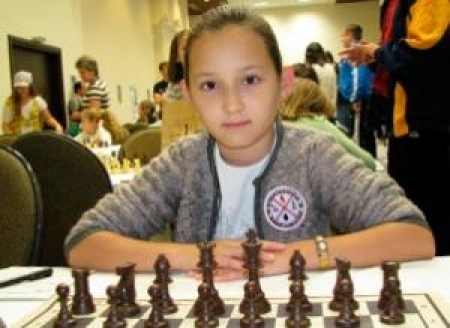 Жансая Абдумалик стала самым молодым гроссмейстером в мире