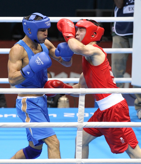 Фоторепортаж с выступления Серика Сапиева на Олимпиаде