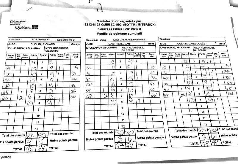 Фото судейских записок победного боя Хусаинова с мексиканцем