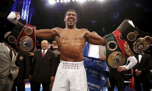 Стала известна реакция Джошуа на бой с Усиком после защиты украинцем поясов в весе Шуменова