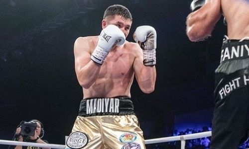 Непобежденный казахстанский боксер с титулом WBC проведет бой на парковке