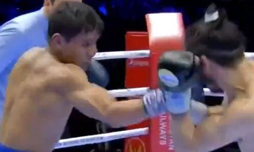 Узбекский чемпион мира забил своего соперника в пятом раунде и защитил пояса IBF и WBA. Видео