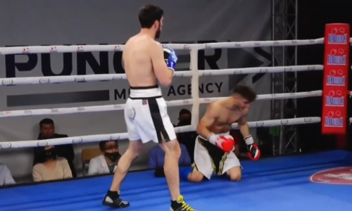 Боксера отправили в нокаут жестким ударом по корпусу в первом же раунде боя в Алматы. Видео