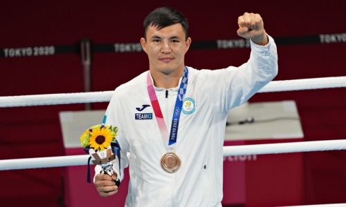 Капитан сборной Казахстана по боксу получил медаль Олимпиады-2020. Фото