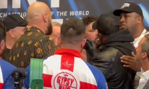 Фьюри и Уайт устроили потасовку на дуэли взглядов перед боем. Видео