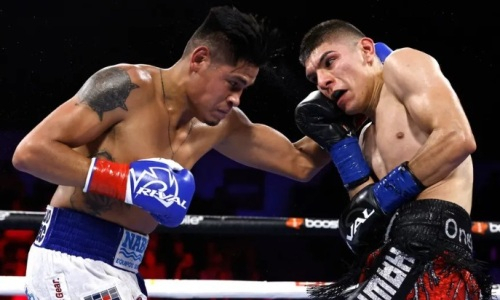 Нокаут спас чемпиона мира от «ограбления». Видео