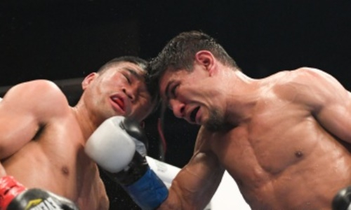 Узбекистанский боксер превзошел соперника в бою за два титула чемпиона мира