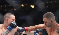 Эффектный финиш определил победителя боя за титул чемпиона UFC. Видео