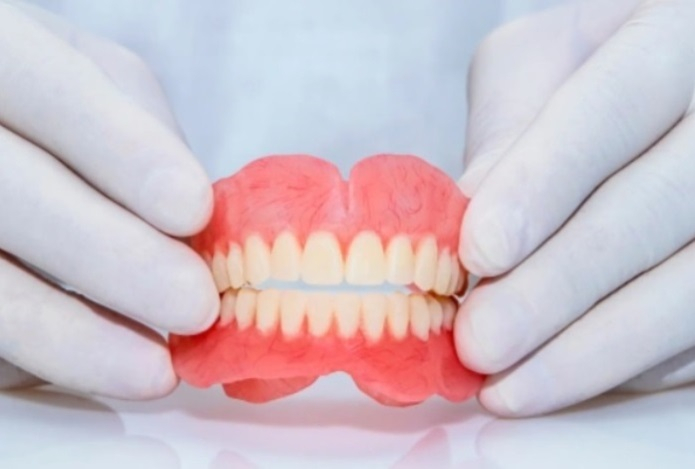 Как связан неправильный прикус и боли в голове и шее